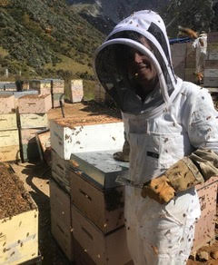 Katie with beehives